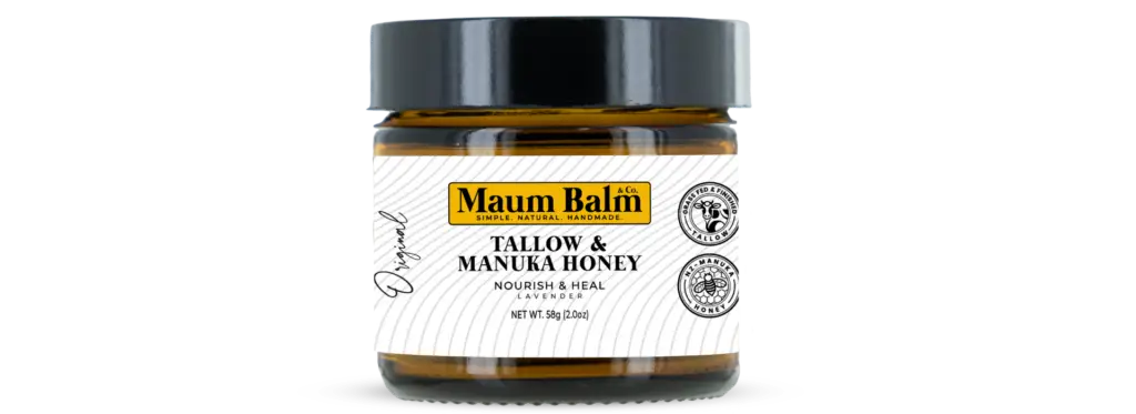 Amber glass jar of Maum Balm Tallow & Manuka Honey with a black lid, featuring a clean label design that highlights its natural, nourishing ingredients.