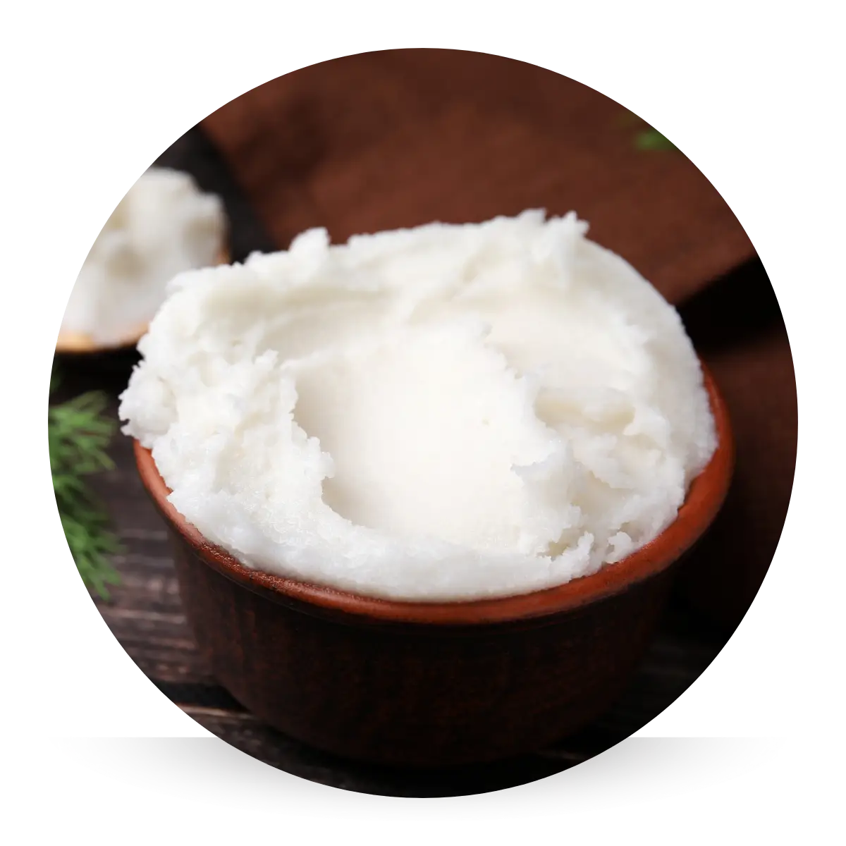 Rich, creamy grass-fed and finished tallow in a wooden bowl, packed with vitamins and fatty acids for deep hydration, smooth skin, and enhanced elasticity.